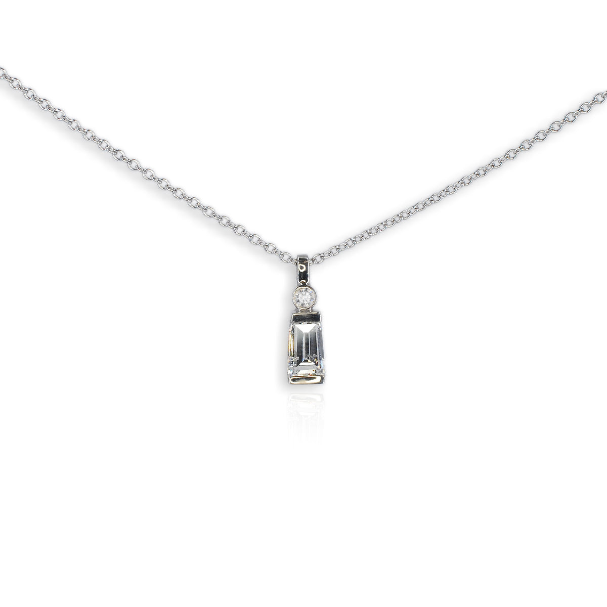Diamond necklace with a pendant on a white background