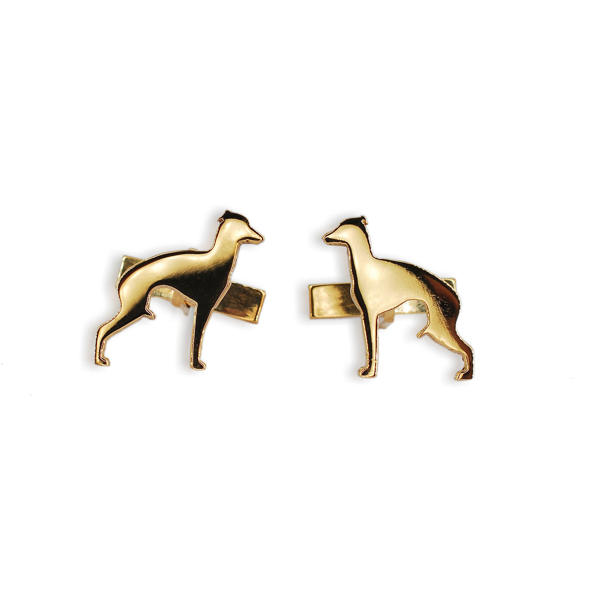 Gold dog-shaped cufflinks on a white background