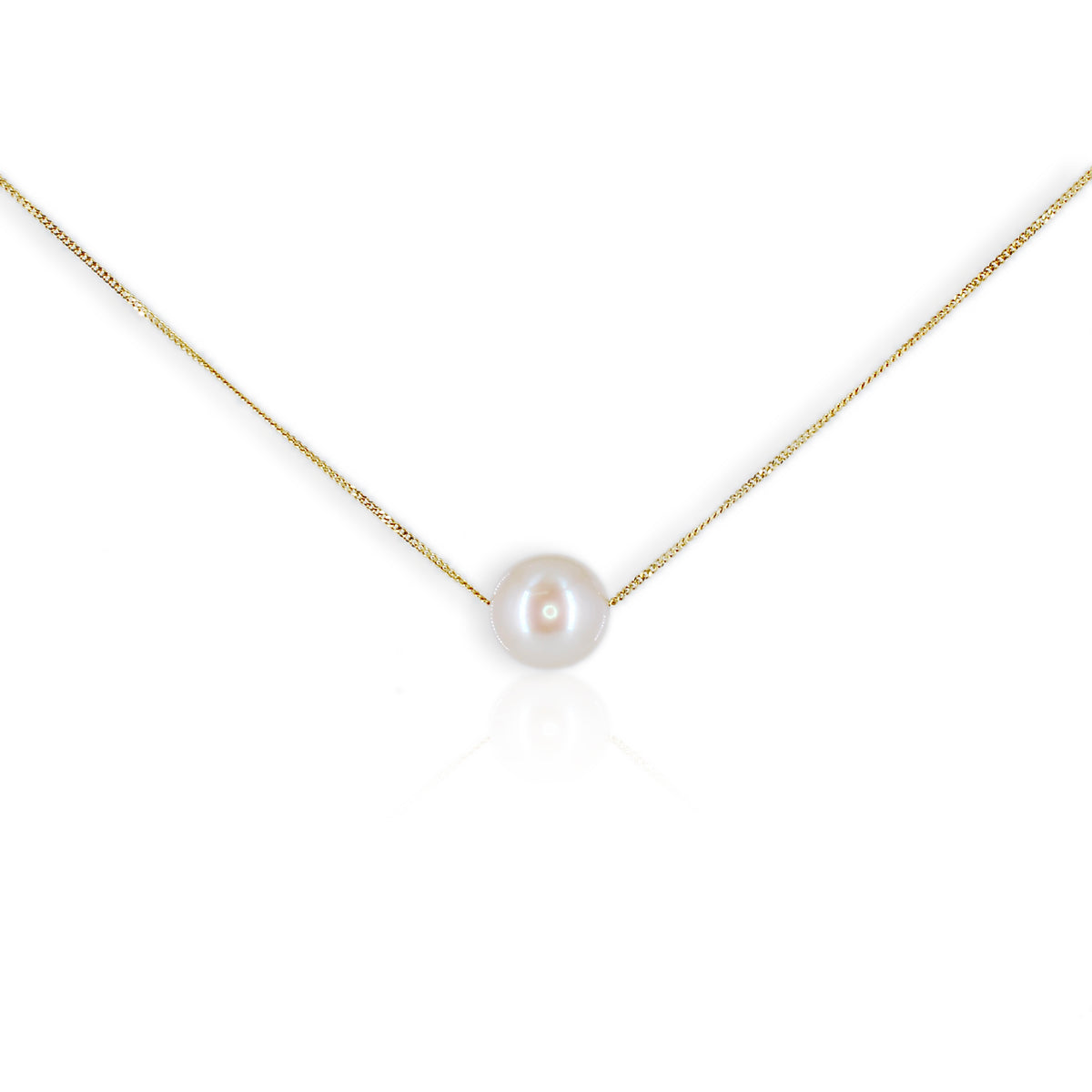 Pearl necklace on a gold chain against a white background